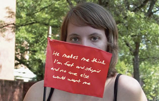 Woman Holding Red Flag